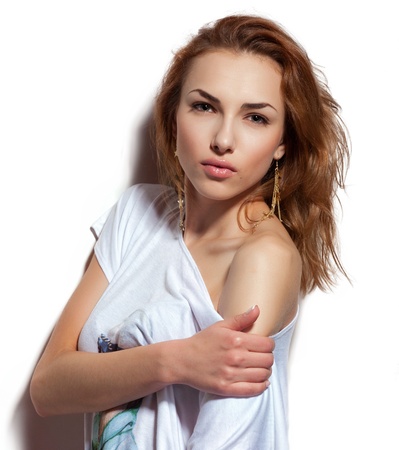 Girl shows her shoulderの写真素材