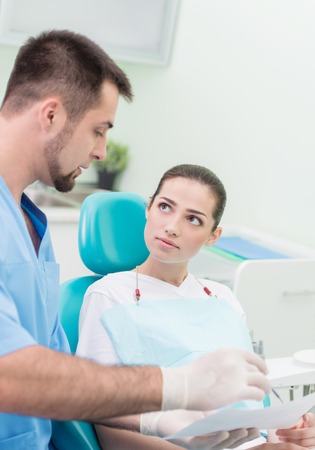 Woman having teeth examined at dentists - dentist Appointmentの写真素材