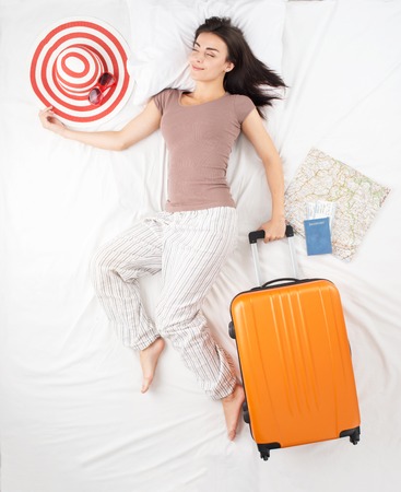 Top view photo of dreaming woman. Woman dreams about vacation conceptの写真素材