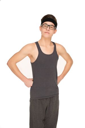 Funny sporty nerd in glasses isolated on white backgroundの写真素材