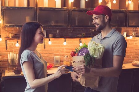 Man with food from food delivery serviceの写真素材