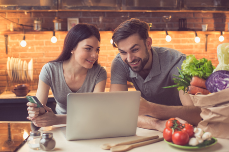 Young couple ordering food onlineの写真素材