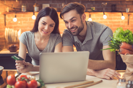 Young couple ordering food onlineの写真素材