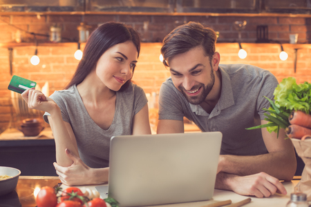 Young couple ordering food onlineの写真素材