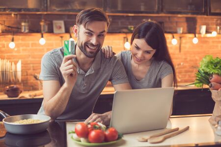 Young couple ordering food onlineの写真素材