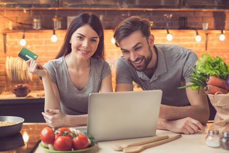 Young couple ordering food onlineの写真素材