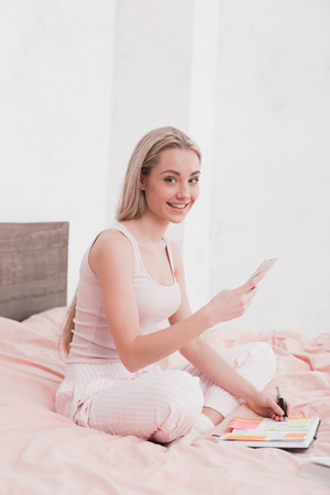 Young Woman Browsing Phone Conceptの写真素材