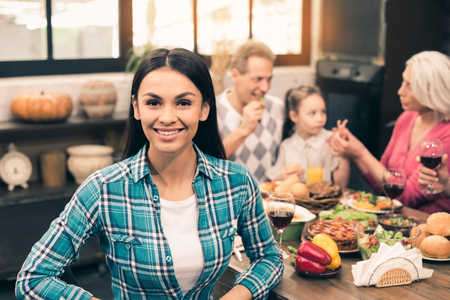Nice family having tasty dinnerの写真素材