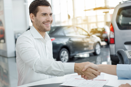 Young People in a Car Rental Service Transportation Conceptの写真素材