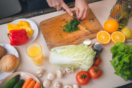 Young Man Vegan Healthy Food Meal Preparationの写真素材