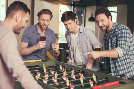 Friends having fun in pubの写真素材