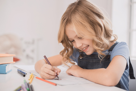 Little kid girl drawing at home creativity developmentの写真素材