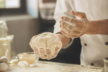 Bakery chef cooking bake in the kitchen professional