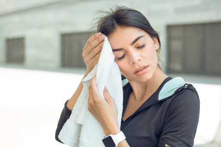 Young woman active exercise workout on street outdoorの写真素材