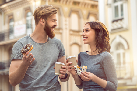 Young couple tourists city walk together vacationの写真素材