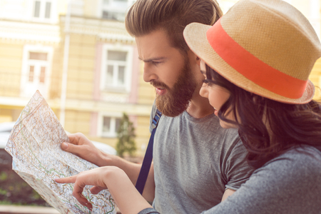 Young couple tourists city walk together vacationの写真素材