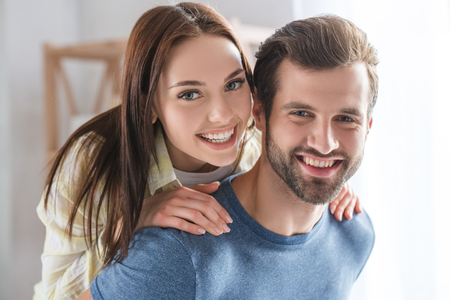 Young family couple together at home casualの写真素材