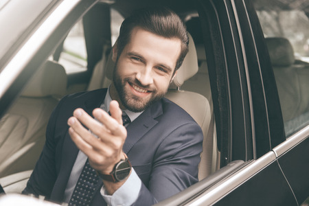 Young business man test drive new carの写真素材