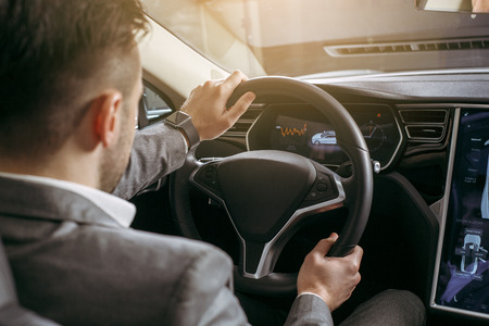 Person transportation by eco car modern technologyの写真素材