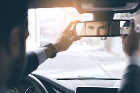 Young business man test drive new carの写真素材