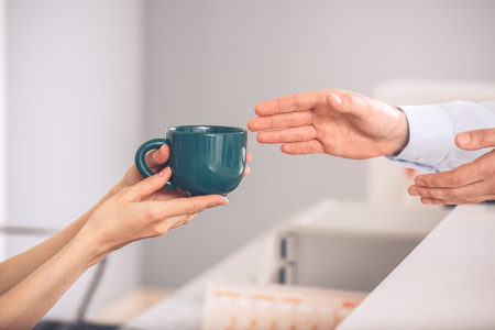 Young woman and man in the business officeの写真素材
