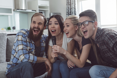 Group of friends having party together at homeの写真素材