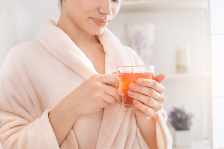 Young woman body care at home indoorsの写真素材