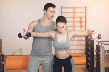 Young people training in gym body fit careの写真素材