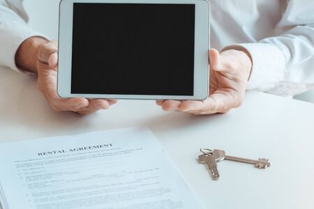 Young man rent apartment real estate agency