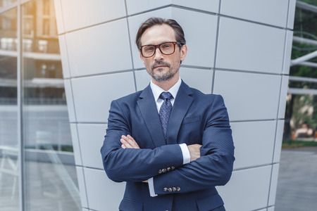 Senior business man outdoors urban background conceptの写真素材