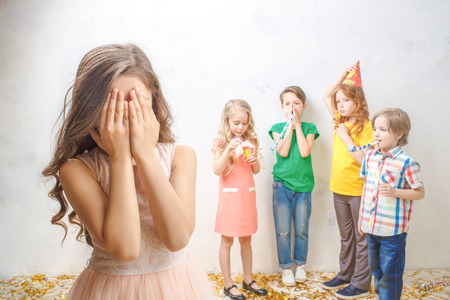 Little kids studio portrait party celebration togetherの写真素材