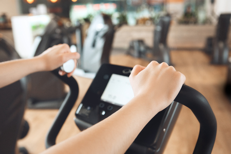 Female training in gym body workout cardio