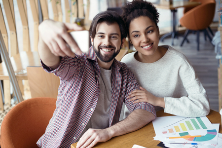 Young people coworking together at creative office sitting takinの写真素材