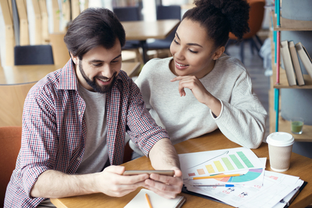Young people coworking together at creative office sitting guy sの写真素材