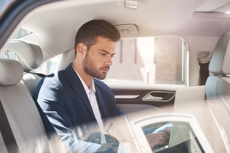 Young business man test drive new car