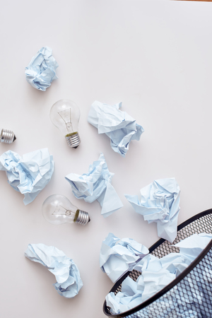 Dont mix trash. Crumple paper falling to the recycling binの写真素材