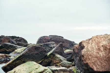 Close up photo of big boulders on the beach. Nature landscape.の写真素材