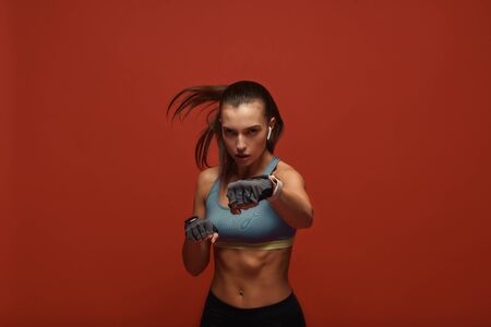 Fitter, healthier, happier, stronger. Sportswoman having work out