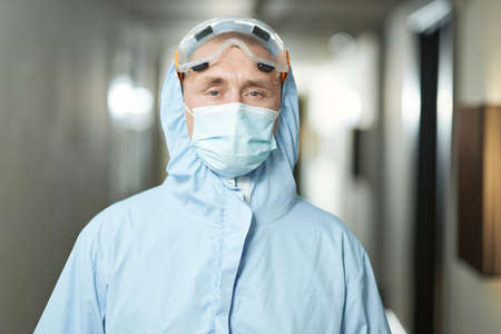 Professional male worker posing in protective clothingの写真素材