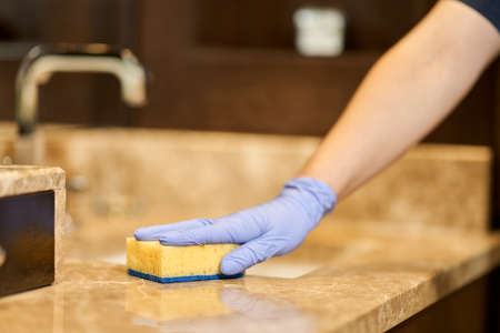 Cleaning and disinfection the bathroom before guests arrive
