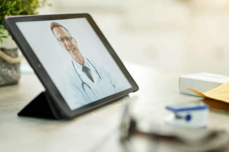 Online medical consultation works best in lockdown timesの写真素材