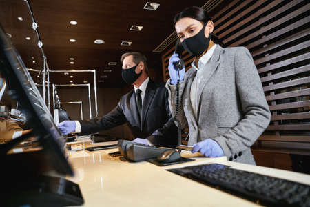 Hotel administrators providing services to their customers