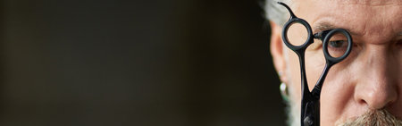 Cropped portrait of brutal gray haired mature man with beard looの写真素材