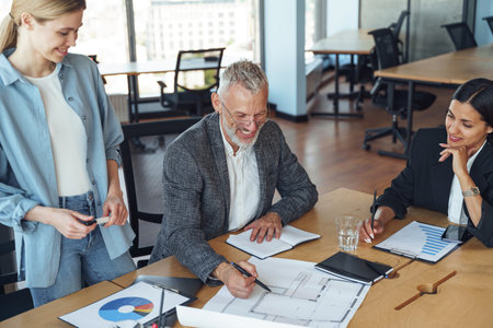 Group of professional business managers working with project documents in officeの写真素材