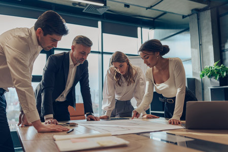 Group of professional business managers working with project documents in officeの写真素材