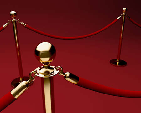 Red carpet with velvet rope barrier and shiny brass stanchionsの写真素材