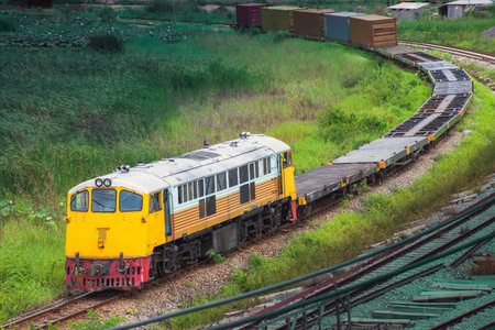Train on the railway track in the countryside of Thailand, Asia.の写真素材