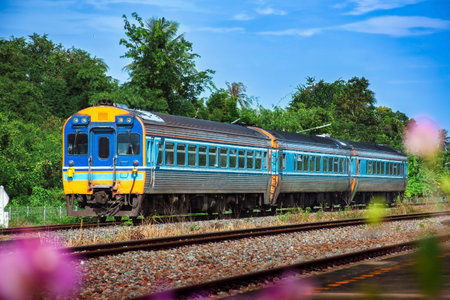 Railway station with blue train in Thailand. Railway travel concept.の写真素材