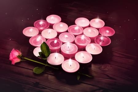 Background with heart set of candles in pink colorの写真素材