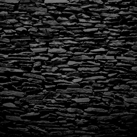 Stone wall, black relief texture with shadow, vector background illustrationのイラスト素材